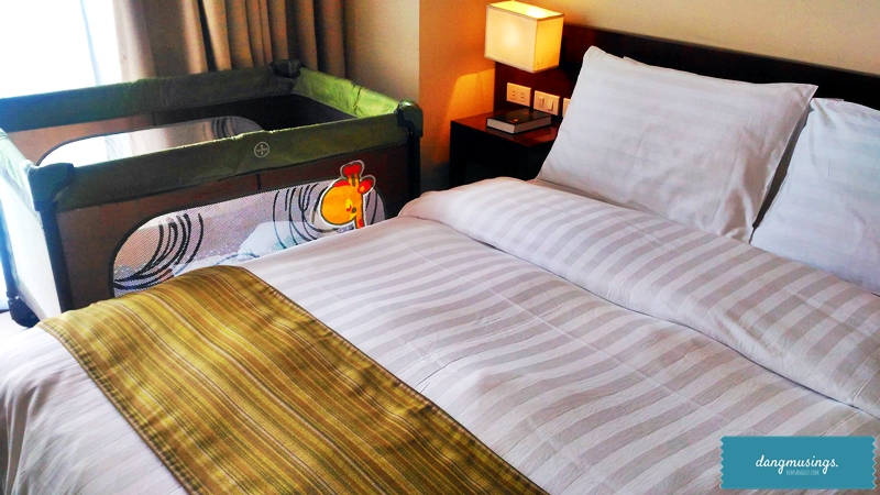 Queen-sized bed and crib